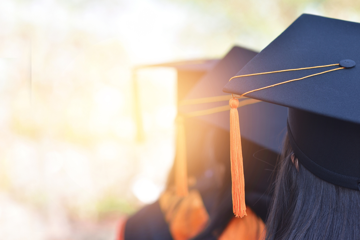 Close-up of graduation caps